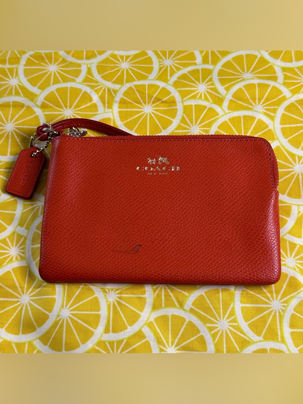 Coach New York orange wristlet